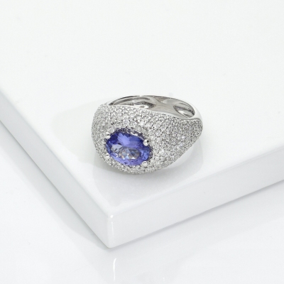 Cocktail diamond tanzanite dome ring in 18kt gold