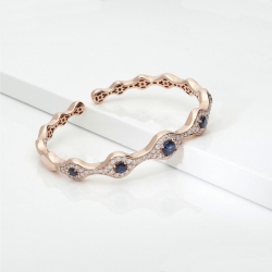 Evil eye diamond sapphire cuff bracelet in 18kt rose gold