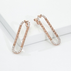 Geometric oval earrings with diamonds in 18kt rose gold