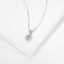 Oval pink sapphire diamond halo necklace