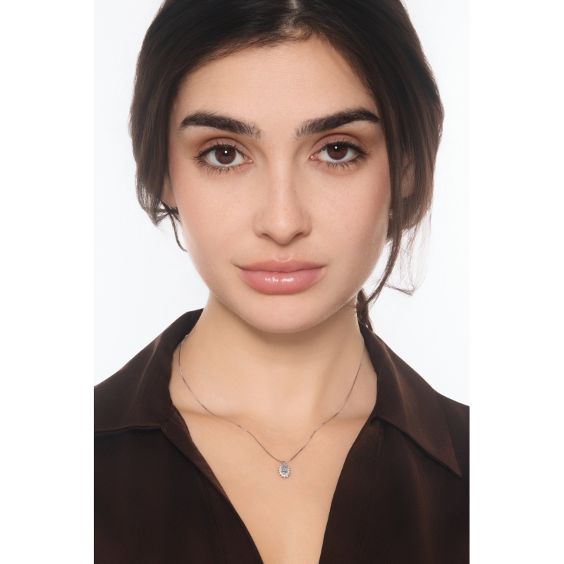 Diamond halo pendant necklace with aquamarine in 18kt white gold