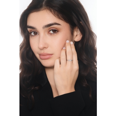 Tension setting white gold ring 0.15 ct diamond