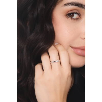 Tension setting white gold ring 0.15 ct diamond