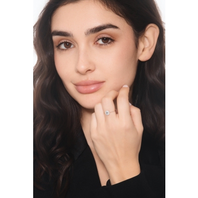 Aquamarine diamond halo ring in 18kt white gold