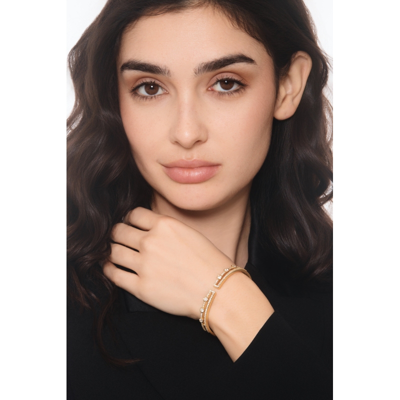 Semi-rigid cuff bracelet in 18kt yellow gold and diamonds