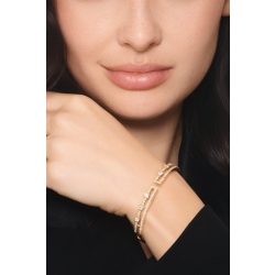 Semi-rigid cuff bracelet in 18kt yellow gold and diamonds 2