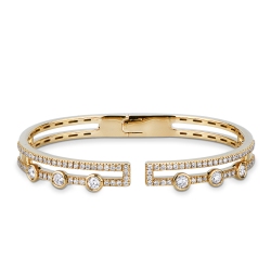 Semi-rigid cuff bracelet in 18kt yellow gold and diamonds