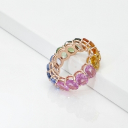 18k yellow gold eternity ring with rainbow sapphires