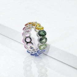 750 yellow gold eternity ring with rainbow sapphires