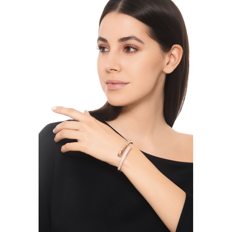 Diamond bypass solid gold bracelet with diamonds