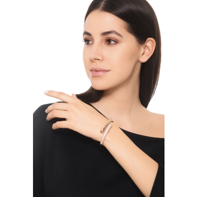 Diamond bypass solid gold bracelet with diamonds