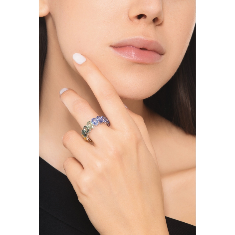 750 yellow gold eternity ring with rainbow sapphires