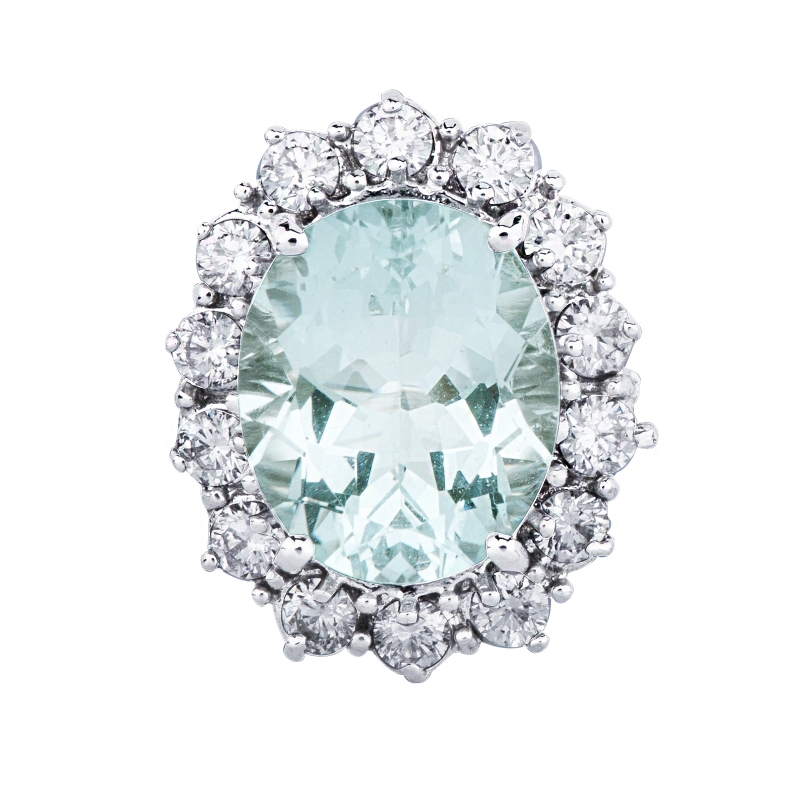 Halo ring with diamonds and aquamarine in 18kt white gold