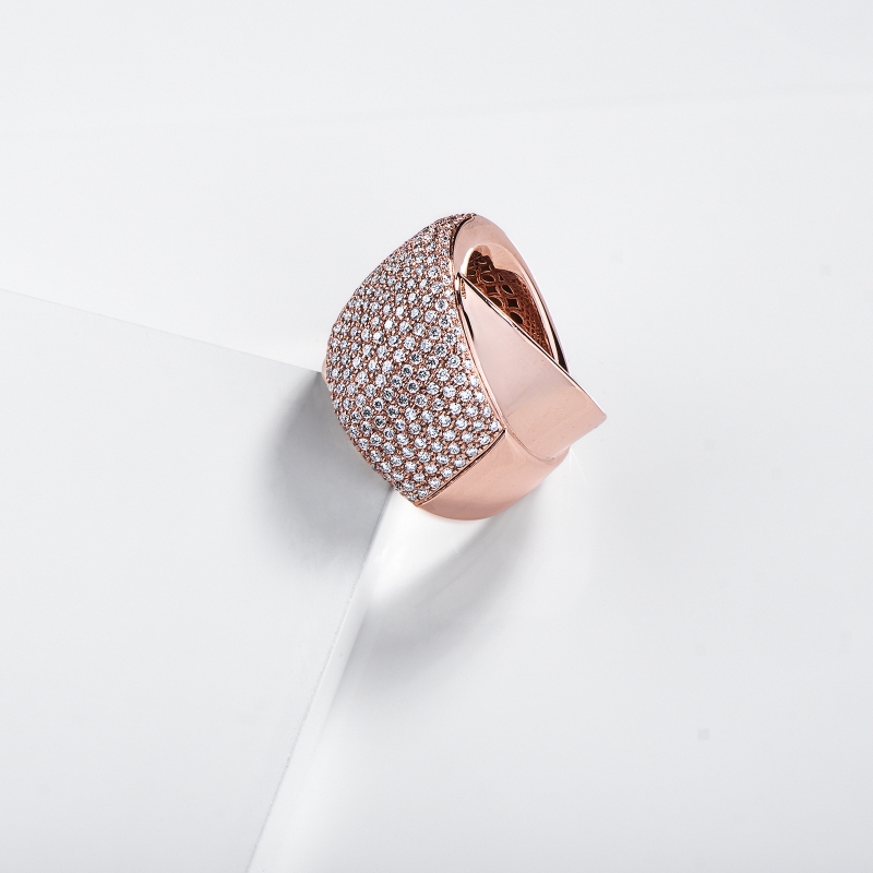 Wide crossover band ring with diamonds in 18kt rose gold