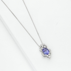 Necklace in white gold 18k with tanzanite oval cut and diamonds