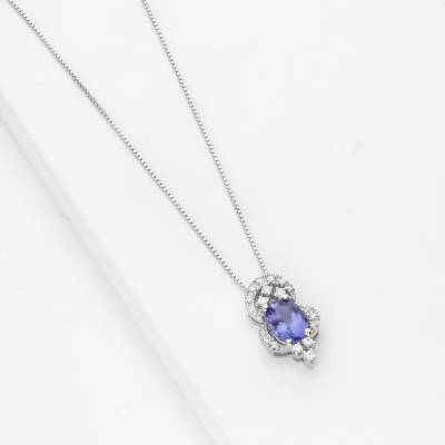 Necklace in white gold 18k with tanzanite oval cut and diamonds