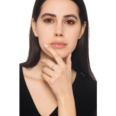 750 white gold trilogy ring with three diamonds, 0.21 ct