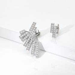 Modern asymmetric 18k white gold earrings with diamonds