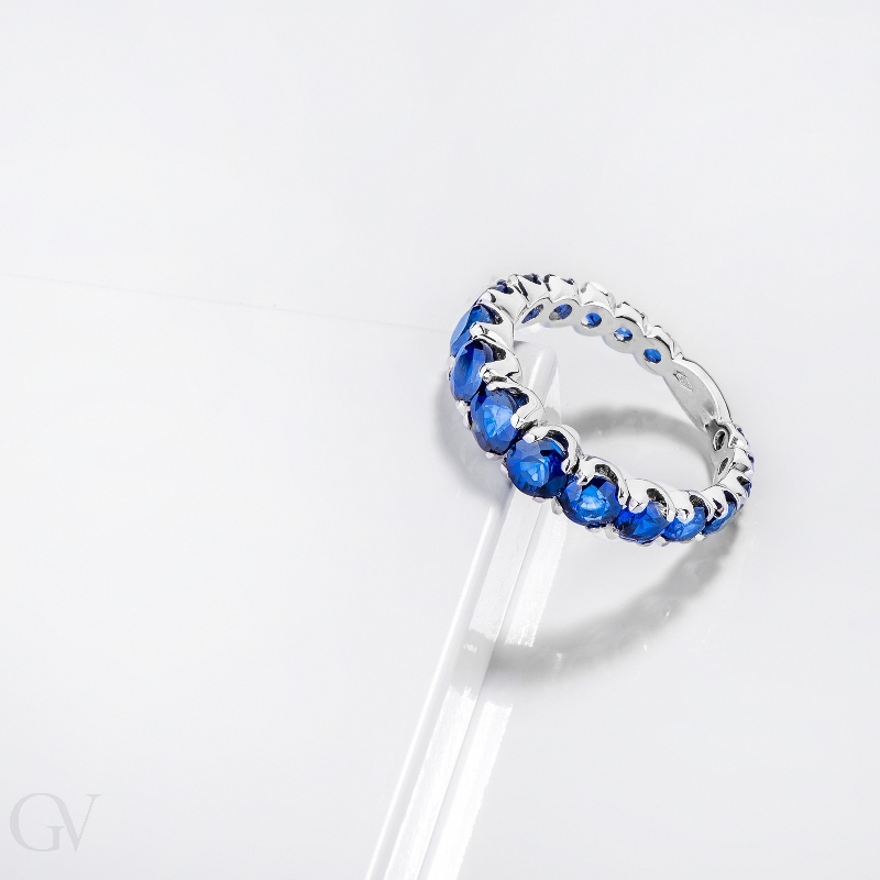 18k white gold half eternity ring with blue sapphires 18k white gold half eternity ring with blue sapphires