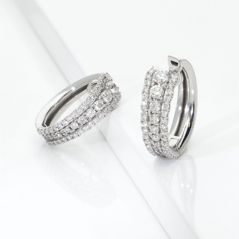 750 white gold graduated diamond hoop earrings