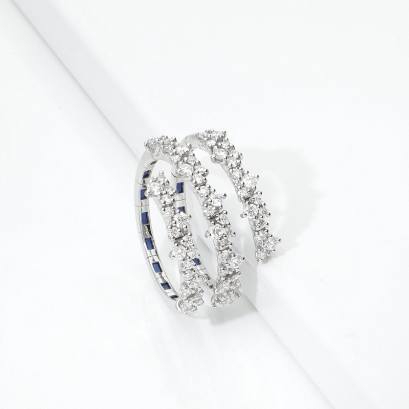 18k white gold coil ring with three diamond wraps