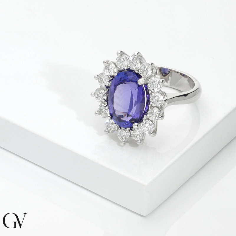 Halo ring in white gold 18k with diamonds and oval tanzanite