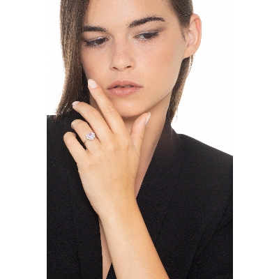 White gold 18k halo ring with a heart cut pink sapphire and diamonds