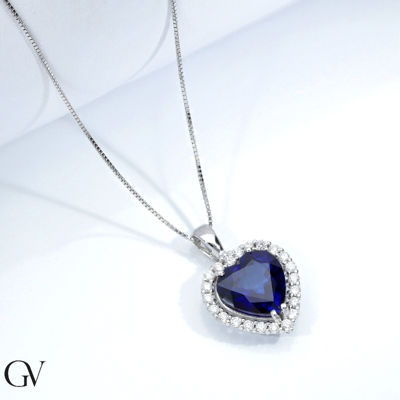 Necklace in white gold 18k with heart blue sapphire pendant and diamonds Necklace in white gold 18k with heart blue sapphire pendant and diamonds