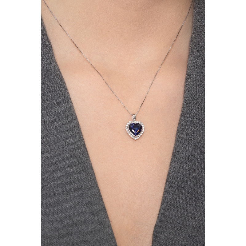 Necklace in white gold 18k with heart blue sapphire pendant and diamonds Necklace in white gold 18k with heart blue sapphire pendant and diamonds