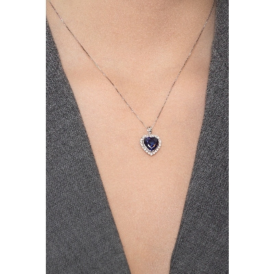 Necklace in white gold 18k with heart blue sapphire pendant and diamonds