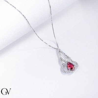 Fancy pendant in 18k white gold with ruby and diamonds