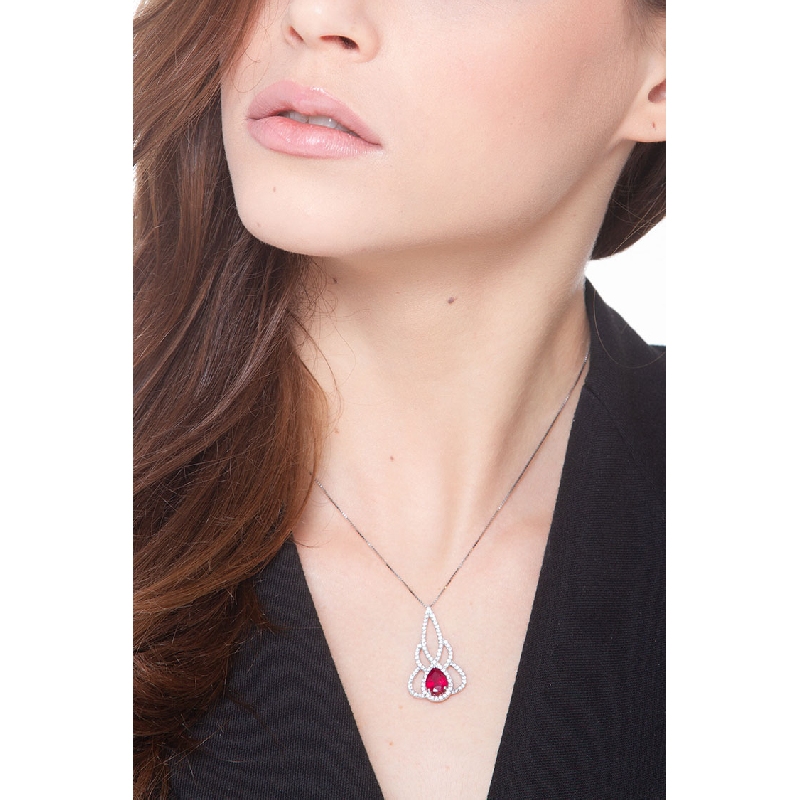 Fancy pendant in 18k white gold with ruby and diamonds