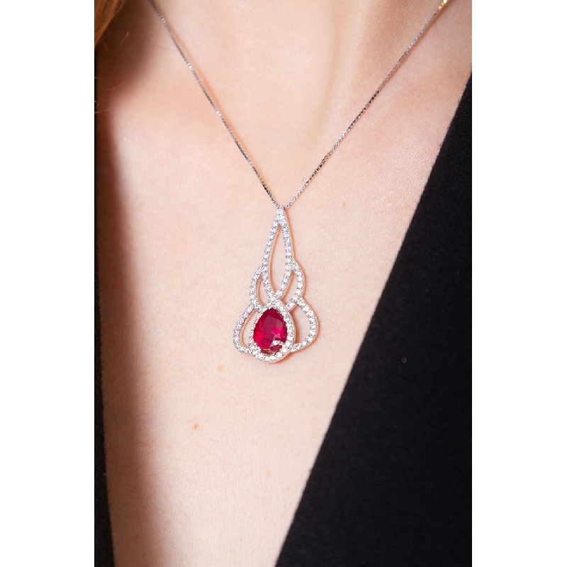 Fancy pendant in 18k white gold with ruby and diamonds