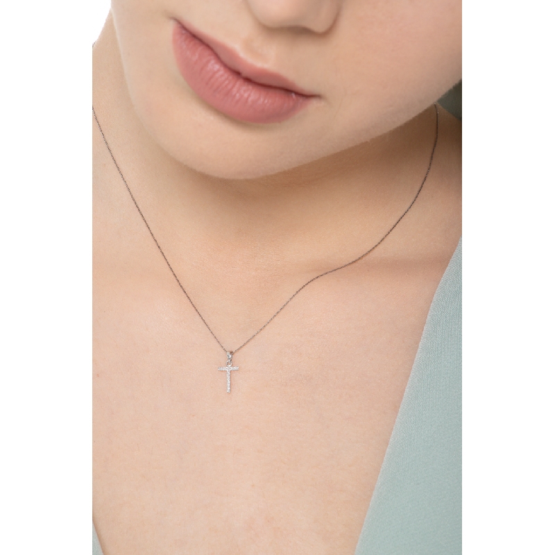 Golden necklace with letter T in diamonds Golden necklace with letter T in diamonds