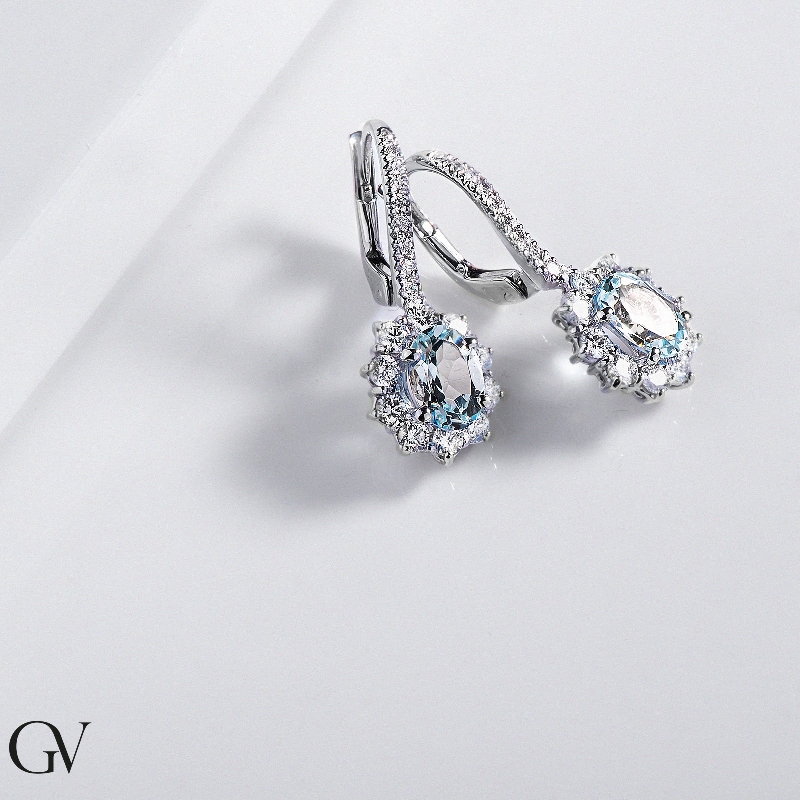 White gold 18k earrings with aquamarine oval cut and diamonds   White gold 18k earrings with aquamarine oval cut and diamonds
