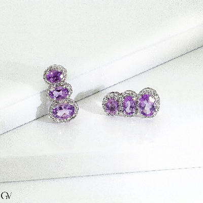 Earrings in white gold 18k with three amethysts oval cut and diamonds