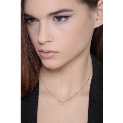 Solitaire necklace in 18k white gold with diamond illusion pendant