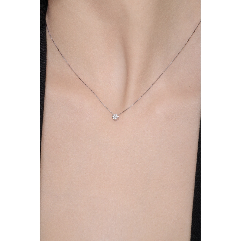 Solitaire necklace in 18k white gold with diamond illusion pendant Solitaire necklace in 18k white gold with diamond illusion pendant