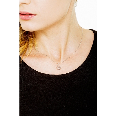 White gold 18k heart pendant with one diamond 