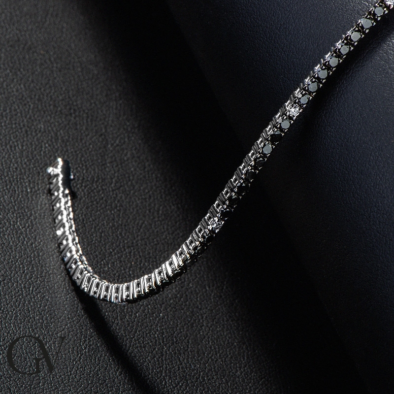 Wire style tennis bracelet with black and white round cut diamonds