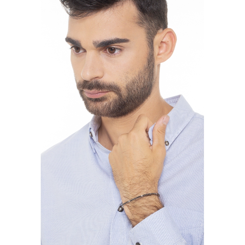 Wire style tennis bracelet with black and white round cut diamonds