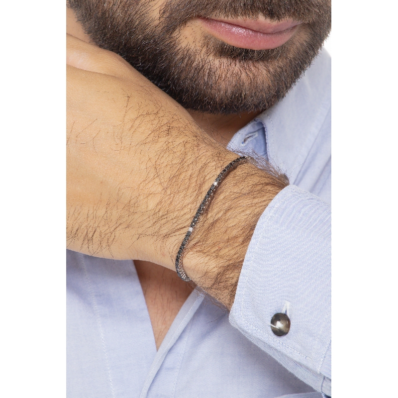 Wire style tennis bracelet with black and white round cut diamonds