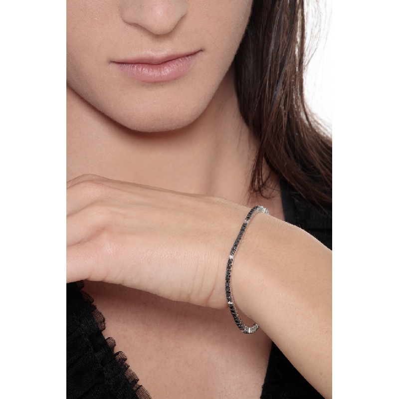 Wire style tennis bracelet with black and white round cut diamonds