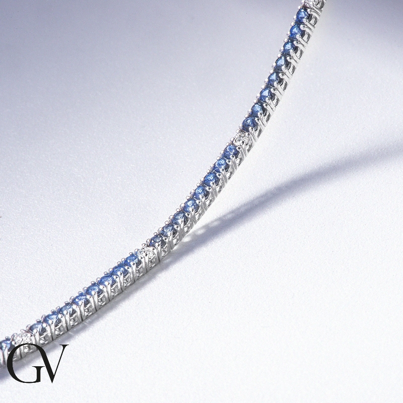 18k white gold tennis bracelet with blue sapphires and diamonds 18k white gold tennis bracelet with blue sapphires and diamonds