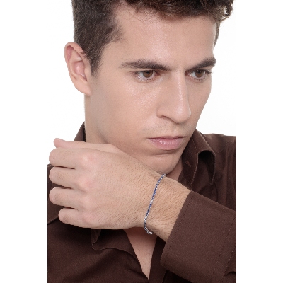 18k white gold tennis bracelet with blue sapphires and diamonds