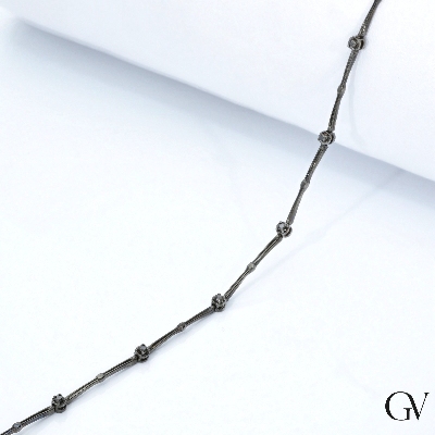 Burnished gold alternate bracelet with black diamonds