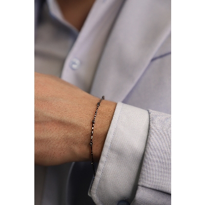 Burnished gold alternate bracelet with black diamonds