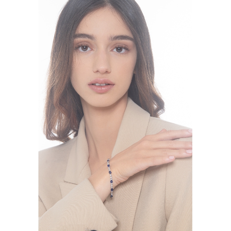 18k white gold alternate bracelet with 12 blue sapphires and 36 diamonds 18k white gold alternate bracelet with 12 blue sapphires and 36 diamonds