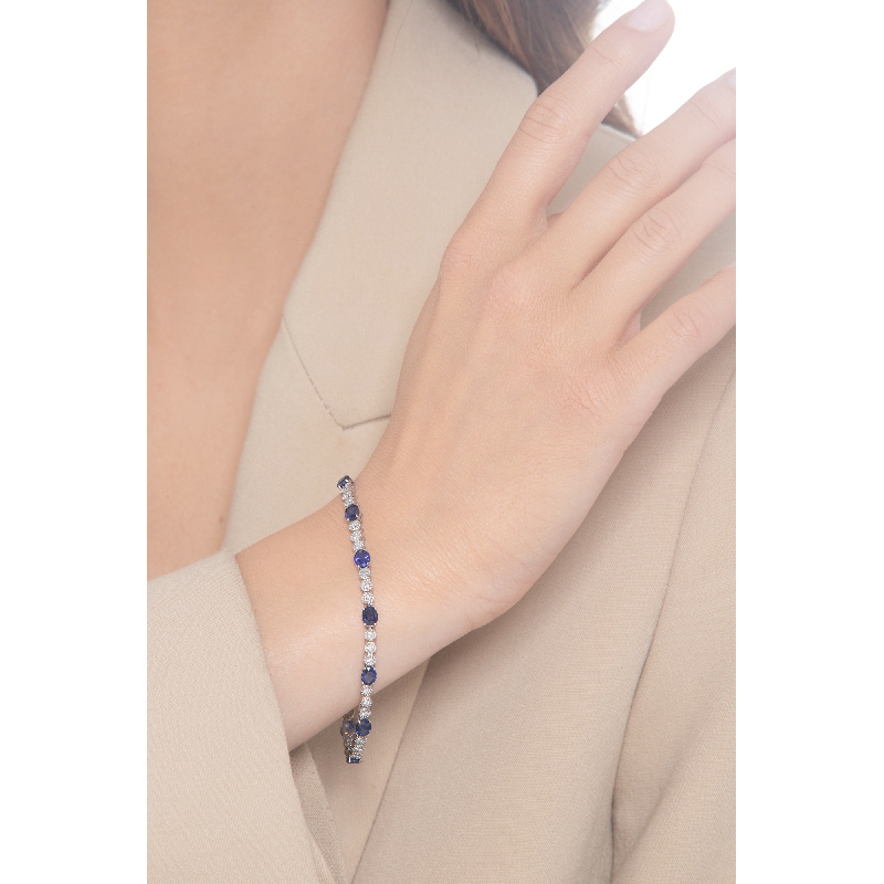 18k white gold alternate bracelet with 12 blue sapphires and 36 diamonds 18k white gold alternate bracelet with 12 blue sapphires and 36 diamonds