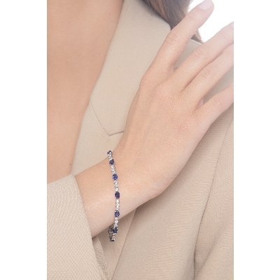 18k white gold alternate bracelet with 12 blue sapphires and 36 diamonds